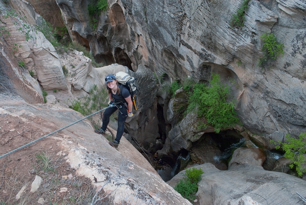 Cami Pulham on the entrance rappel to Boundary Canyon.