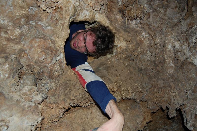 Aaron Stockton at the squeeze in Cave Tree Cave