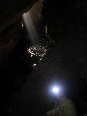 Jon Jasper in the entrance to Cueva del Arroyo Desciante. Photo by Brandon Kowallis
