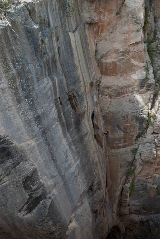 Janel Macy on the 300-ft entrance rappel to Englestead Canyon