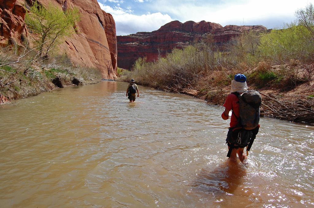 Mike and Tim wading along the Escalante River to return to camp after Baker Canyon