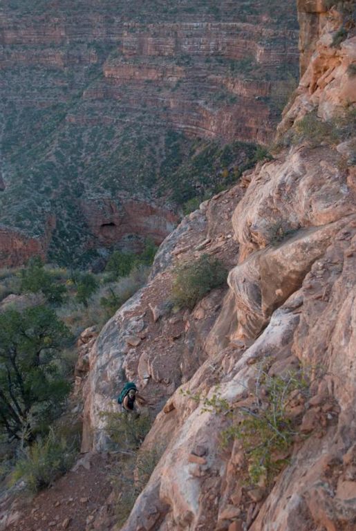 Pete Shifflett  climbing up through the Supai with unexplored cave leads (Single Bopper Cave) in background.