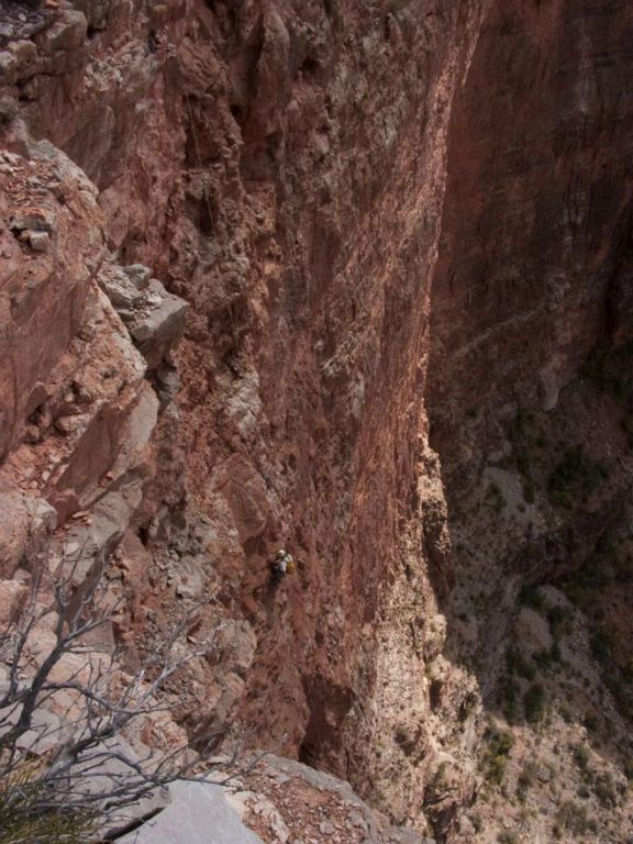 Jason Ballenski rappeling off 500+ ft cliff to reach cave lead - Billow Cave.