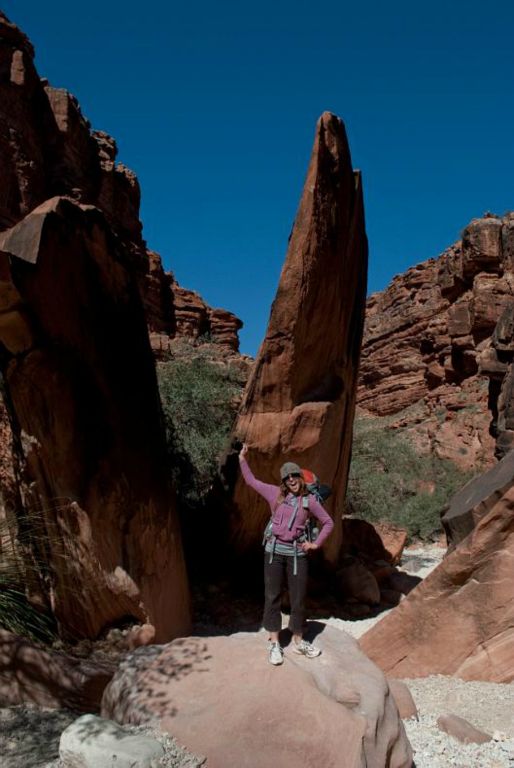 Janel Macy in front of rock pinnacle in Havasu Canyon