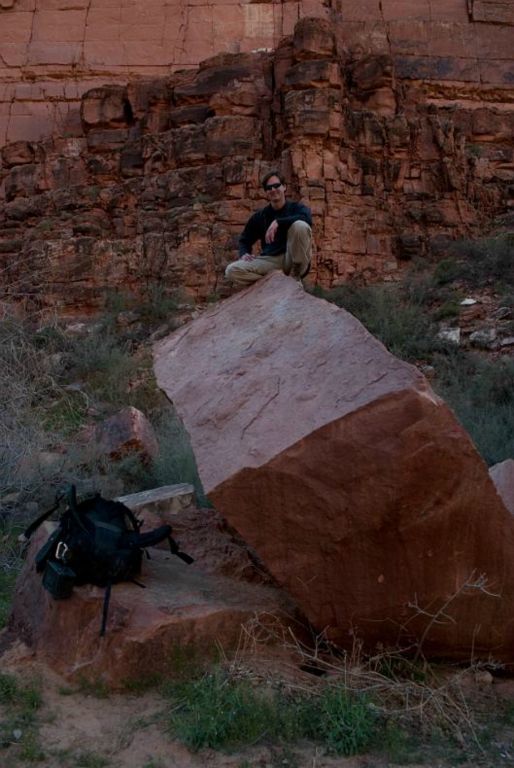 Jon Jasper on top of large cube rock.