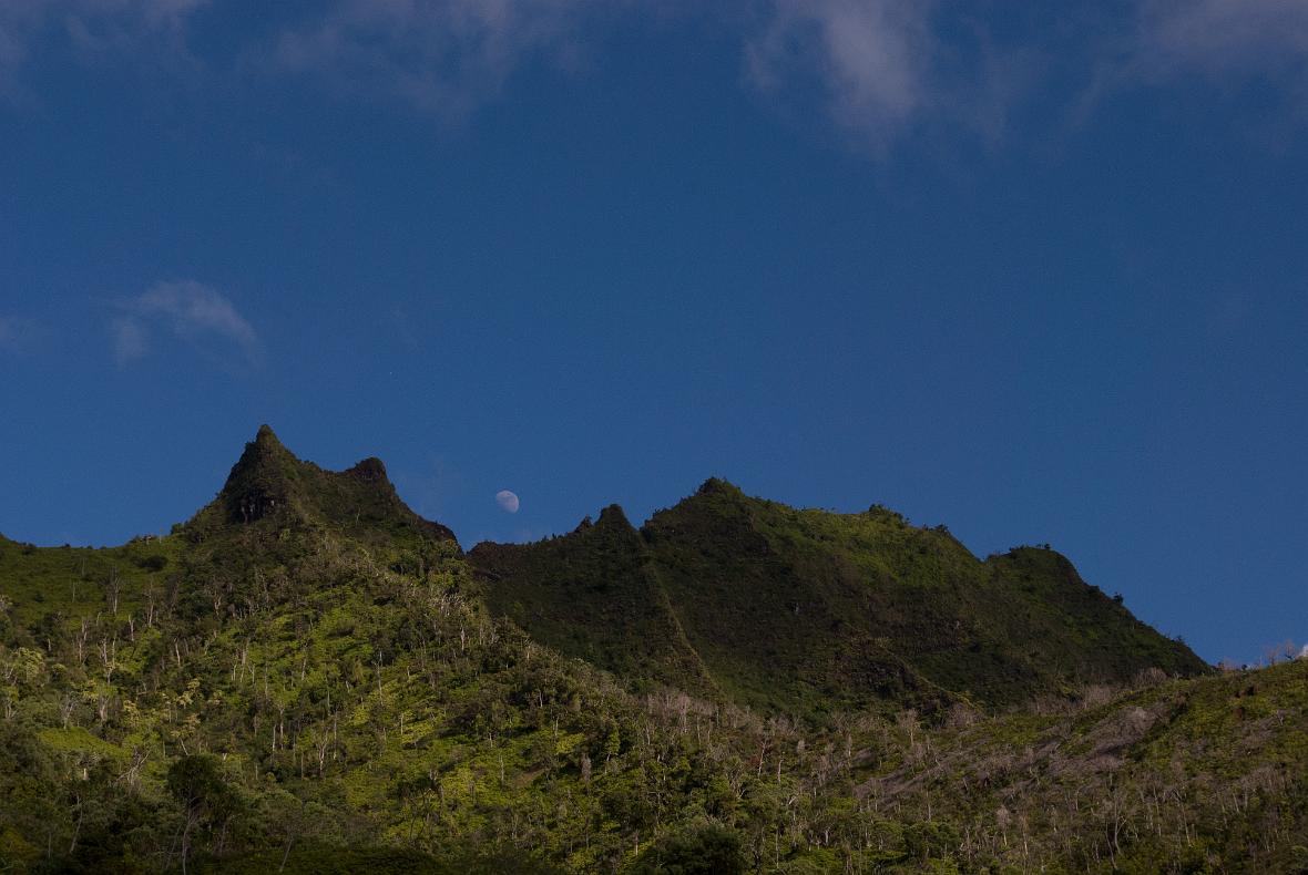 Setting moon seen from Kalalau Trail on the Na Pali coast.