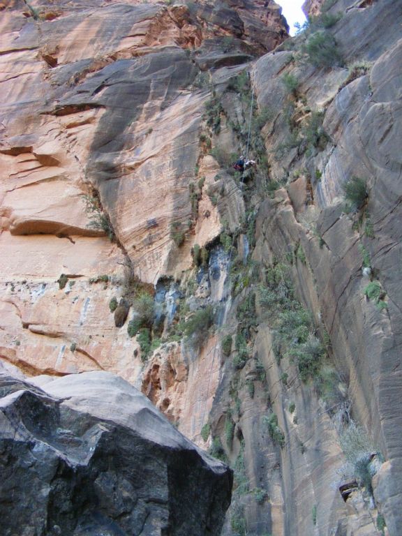 Shaun Roundy on the final, free rappel in Behunin Canyon. Photo by Jason Mateljak.
