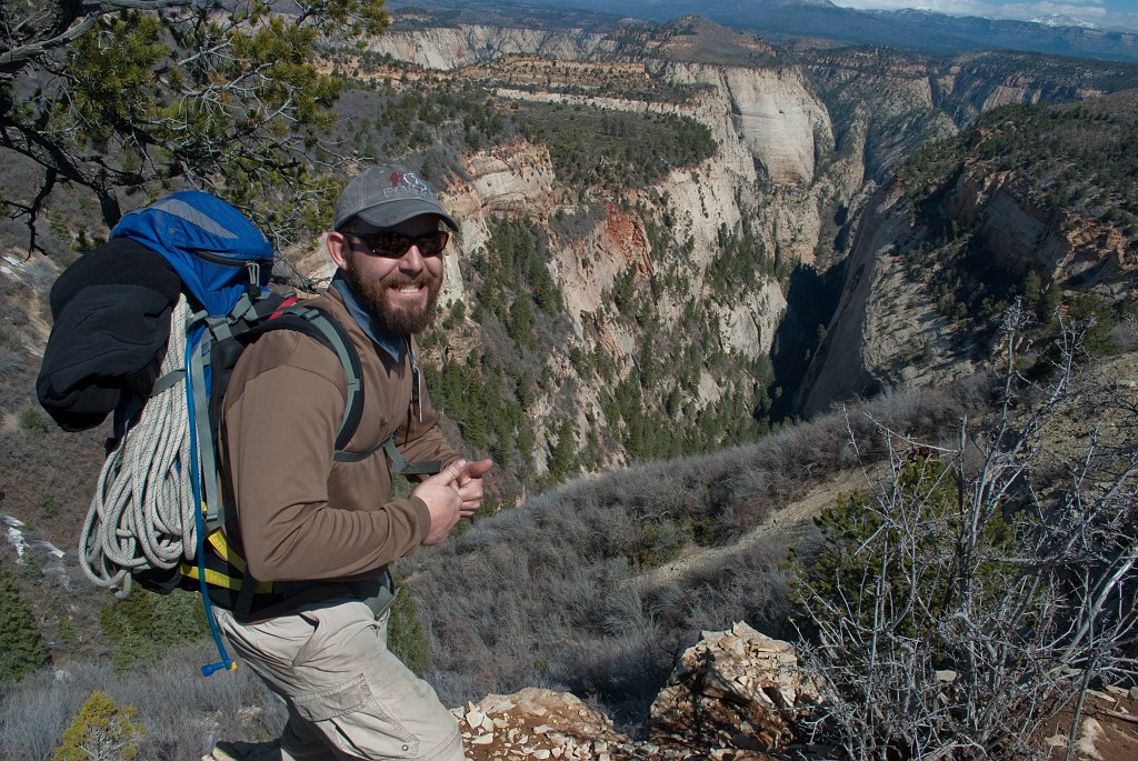 Jason Mateljak grinning at the view into Mystery Canyon.