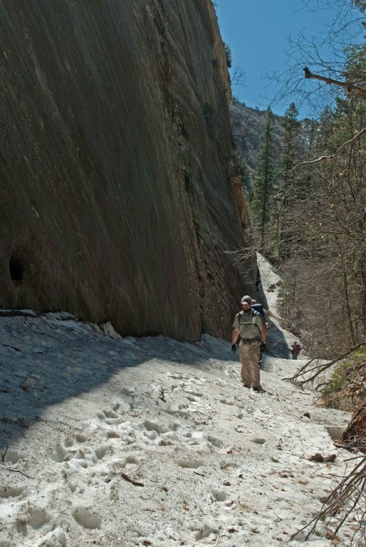 Jason Mateljak hiking along the snowy floor of Mystery Canyon