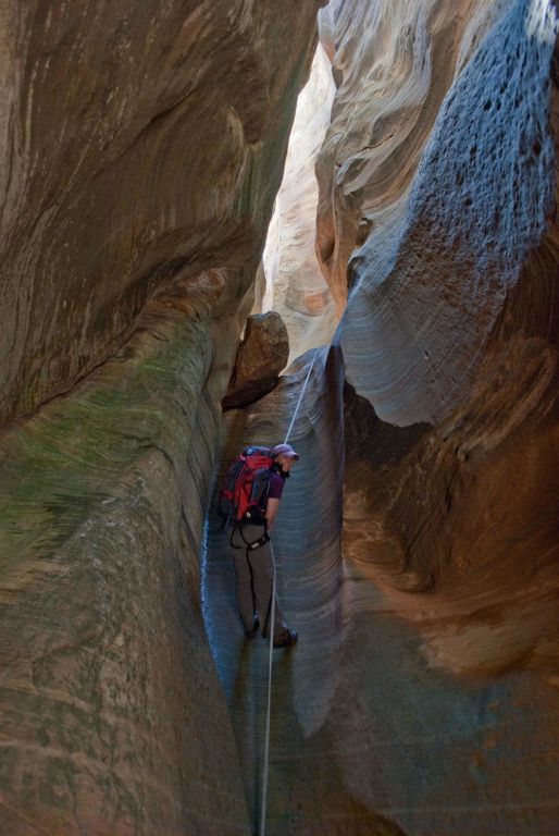 Rachael Keske rappelling in the upper technical section of Mystery Canyon.