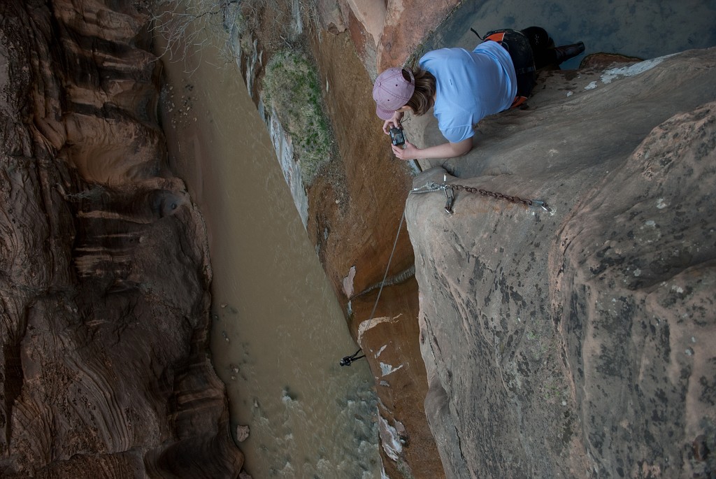 Rachael Keske filming Shaun Roundy's descent into the Zion Narrows.