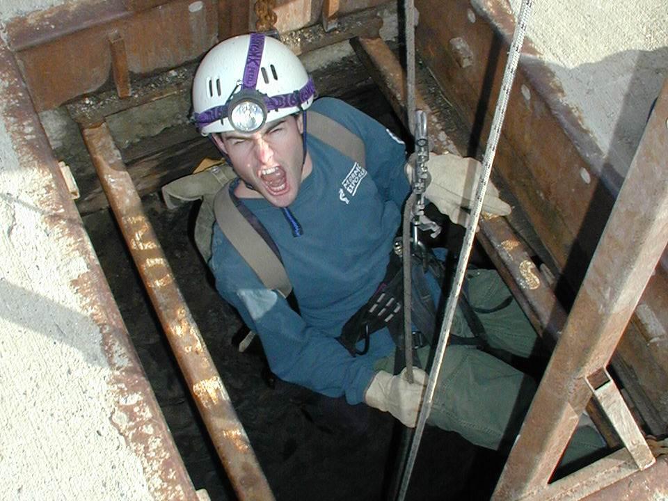 Brandon Kowallis heading into the 200 ft mine shaft to Candlelight Cave