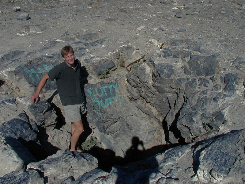 Jon Jasper standing at the entrance to Nutty Putty Cave