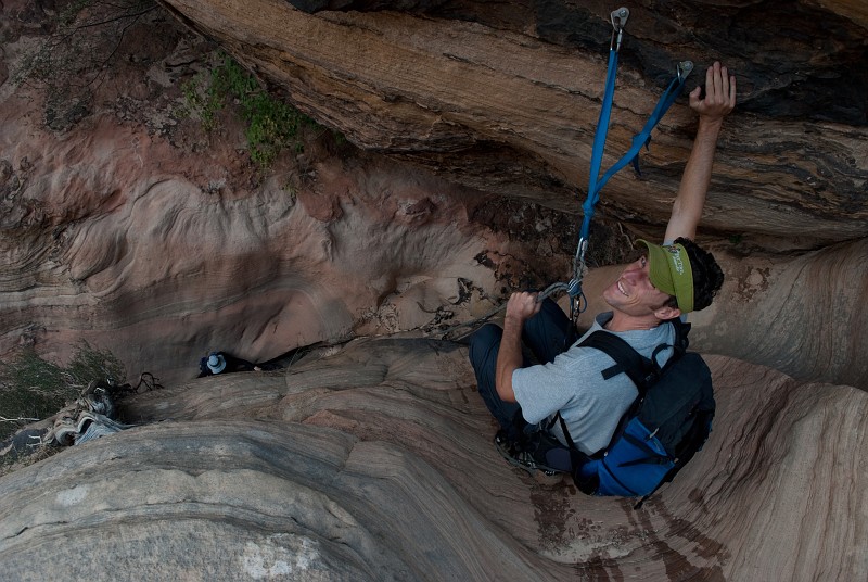 Joel Silverman on top of short rappel in Spry Canyon.