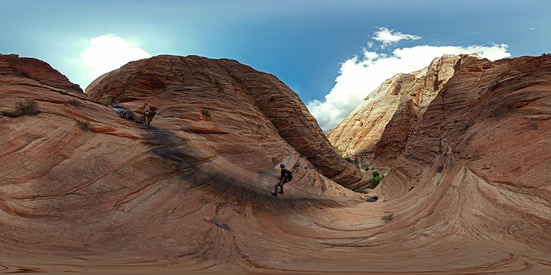 Panoramic view of Matt on 200-ft entrance rappel to Spry Canyon.  Full Panoramic photo at jonjasper.com.