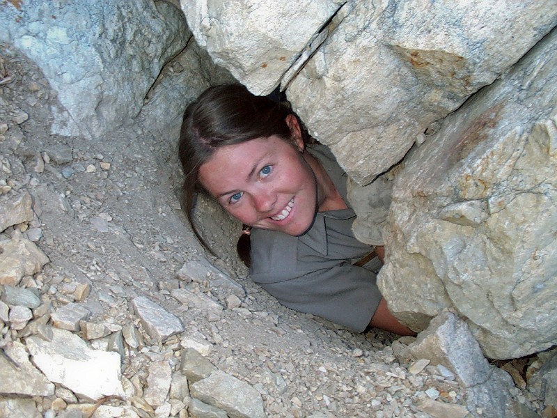 Cami Pulham sweezing out of one of the pipeline tunnels.
