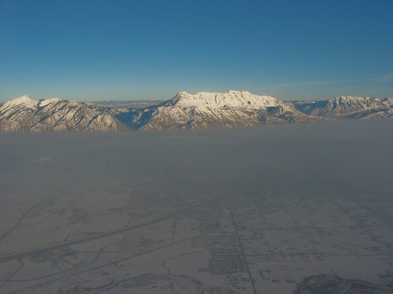 View of the mouth of American Fork Canyon and Mount Timpanogos from the air.