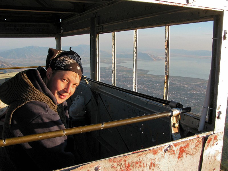Katherina Dittmar in the hut at the top of Mount Timpanogos overlooking the Utah Valley
