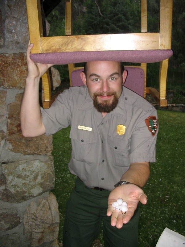 Jason Mateljak safely collecting hail from outside of the Rock House.