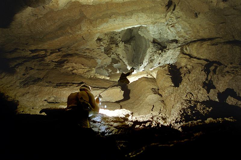Jon Jasper ascending from the bottom of Polygamy's End Cave, Utah, Lookin straight up.  Photo by Brandon Kowallis