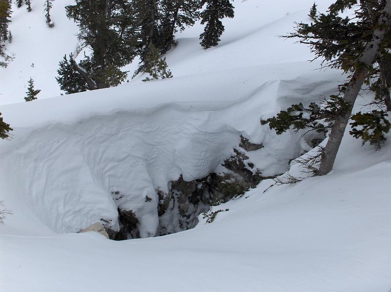 Main Drain Cave entrance in the middle of winter.  The snow drifts around the entrance are about 10 ft thick.