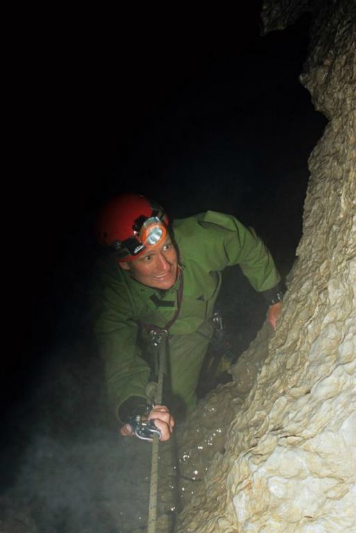 Jon Jasper ascending up the last pit in Polygamy's End Cave after bolting over to the side lead