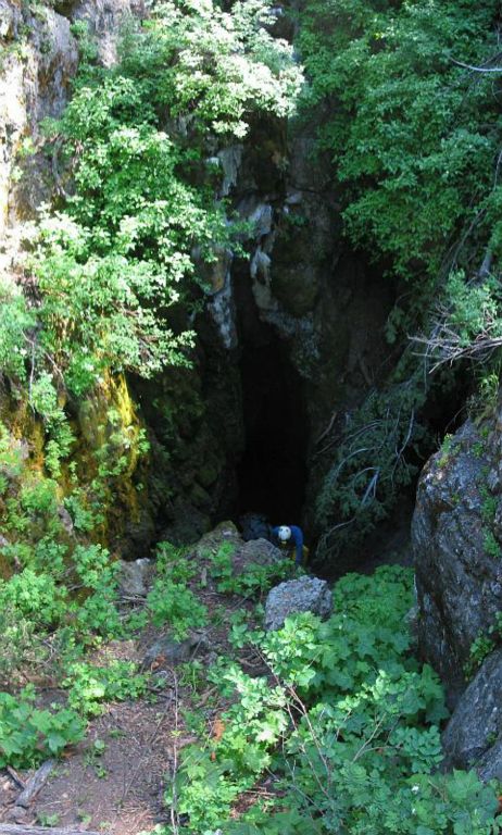 Peter Hartley exiting Neilson Cave.