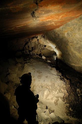 Jason Ballenski flashing the Breakdown Room in Main Drain Cave.  Photo by Brandon Kowallis
