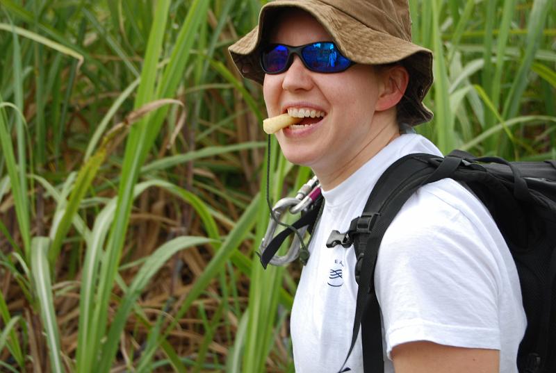 Megan chewn on sugar cane.  Photo by Jack Wood