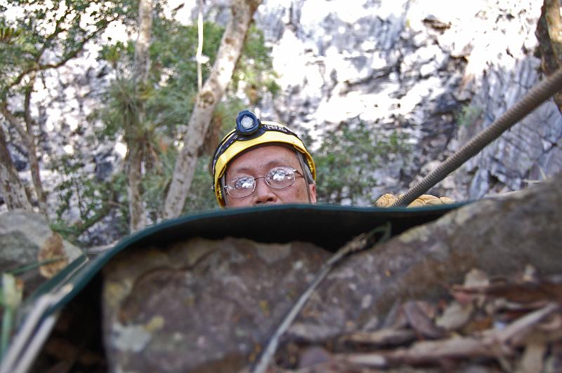 Dan Fong reaching the lip of Bee Cave