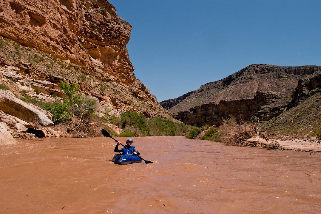 Tim Barnhart boating down the Virgin River just after entering the Beaver Dam Wilderness.