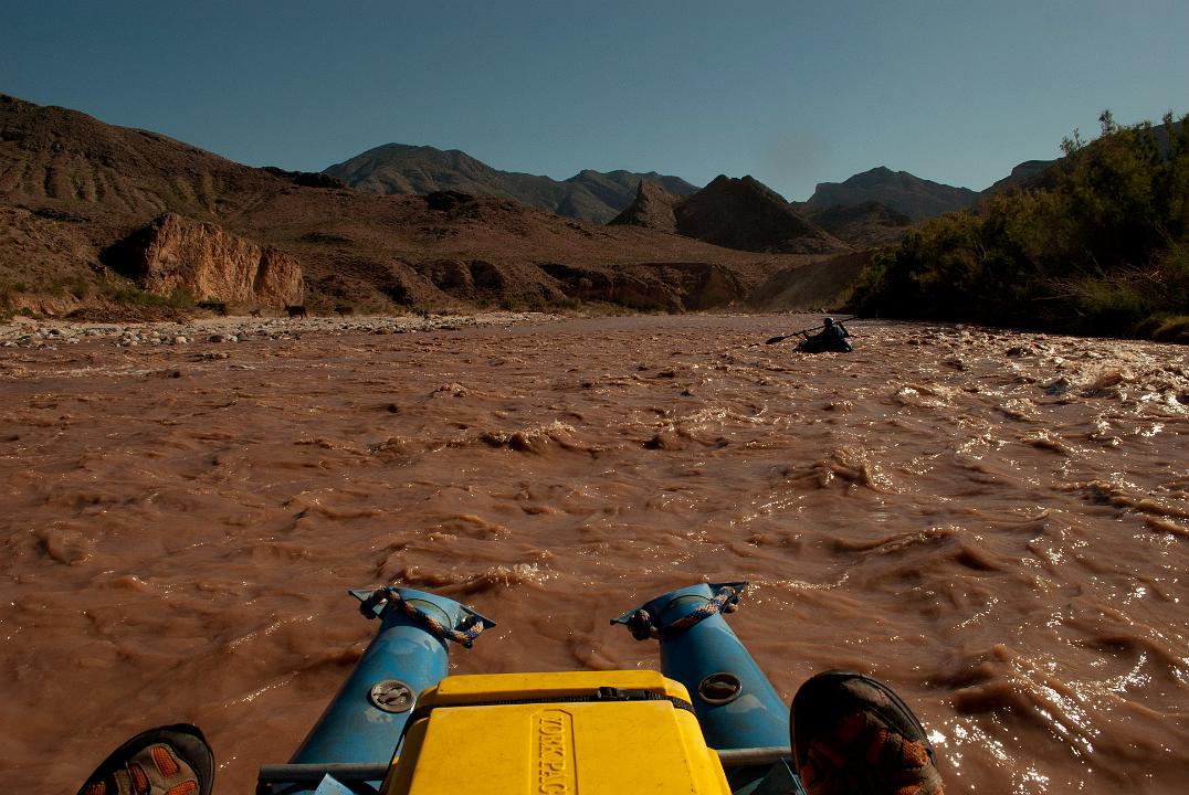 Tim Barnhart boating down the Virgin River just below the Virgin River Canyon Recreation area in the Paiute Wilderness.