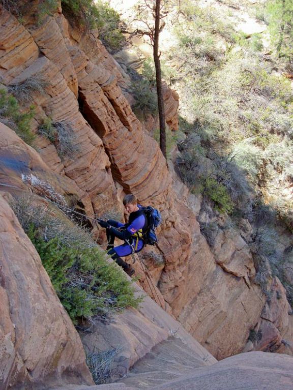 Jon Jasper starting down the 160-ft rappel of Water Canyon.  Photo by Kyle Voyles.