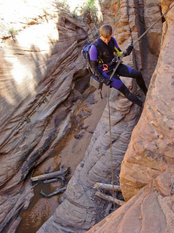 Jon Jasper on 80-ft rappel in Water Canyon.  Photo by Kyle Voyles.