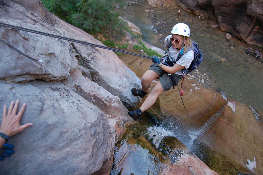 Christina on the final rappel in the Zion Narrows from Mystery Canyon.