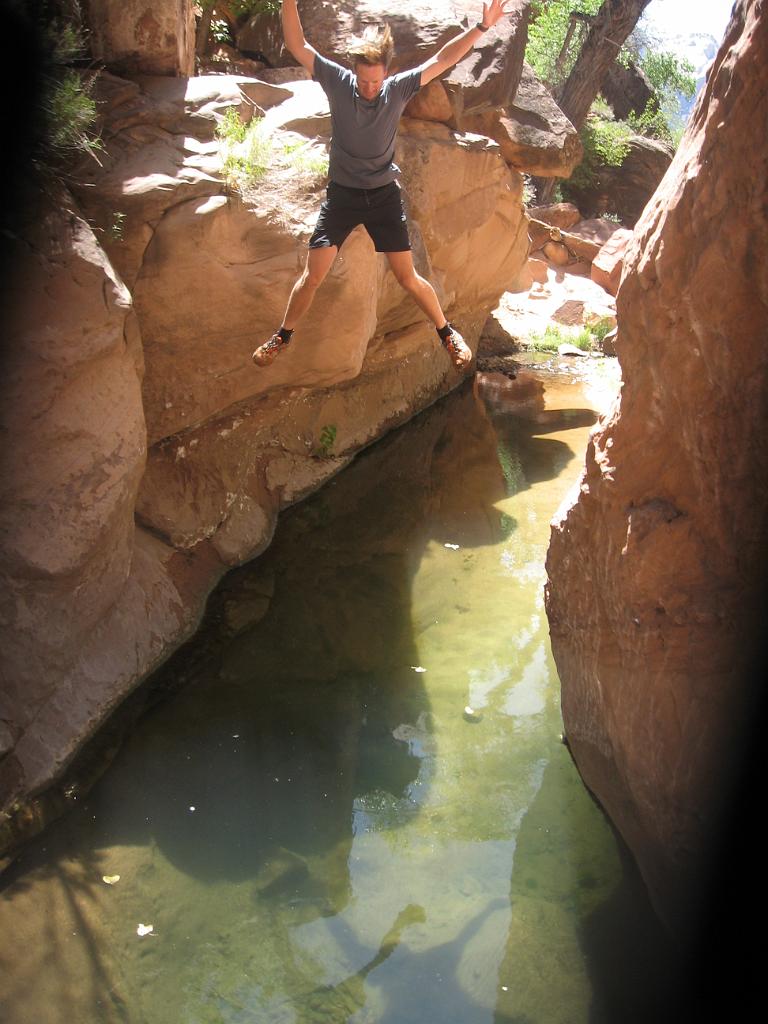 Jon Jasper jumping into pool on the way out of Pine Creek Canyon.  Photo by Jason Mateljak.
