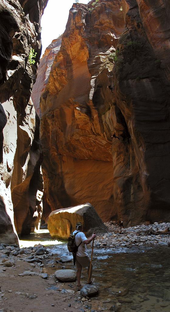 A series shot of Andrew rappeling into the Zion Narrows from Imlay Canyon.