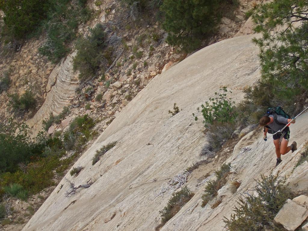 Jon Jasper rappeling off of the rim into the Phantom Valley.  Photo by Tim Barnhart