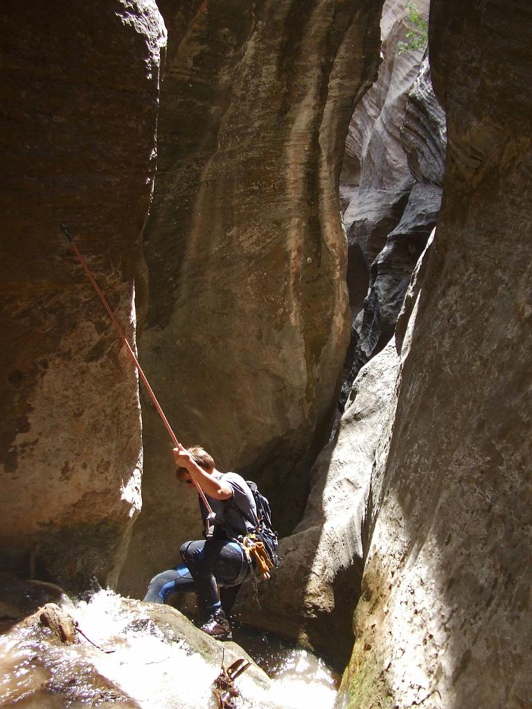 Jon Jasper rappeling in Oak Creek Canyon.  Photo by Tim Barnhart