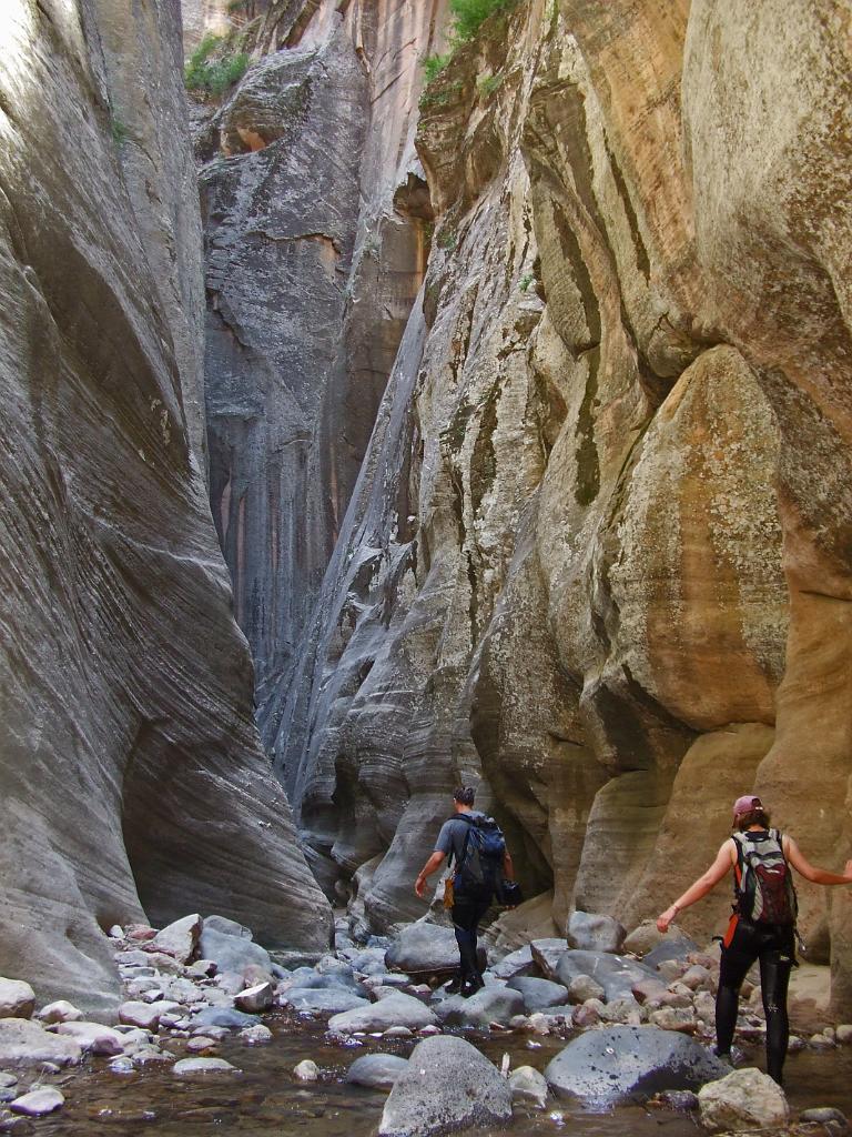 Jon Jasper and Racheal Keske following the Kolob Canyon via Oak Creek Canyon.  Photo by Tim Barnhart