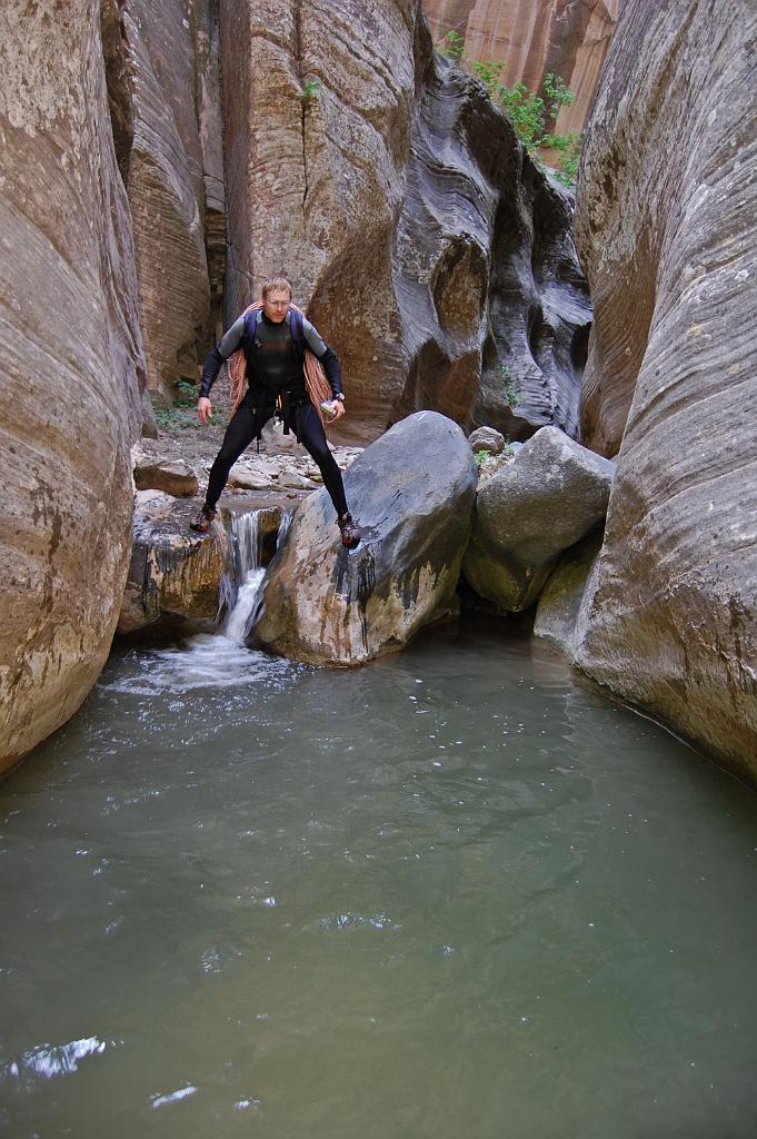 Tim Barnhart jumping into pothole in Oak Creek Canyon.