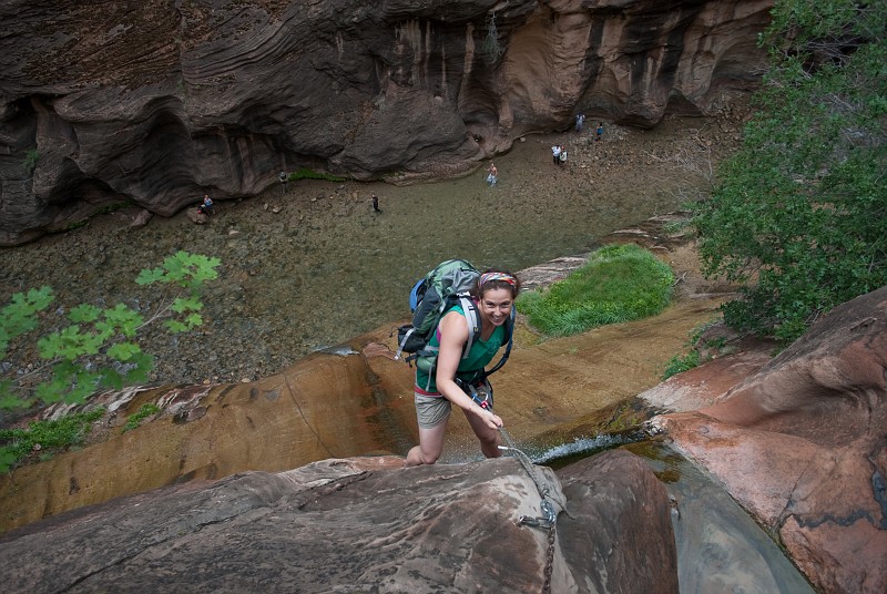 Kate Feller starting down the final rappel of Mystery Canyon in the Zion Narrows