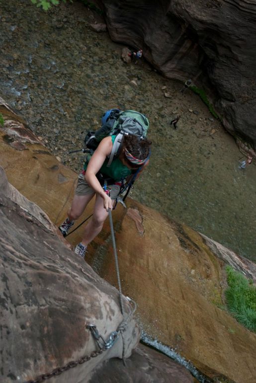 Kate Feller starting down the final rappel of Mystery Canyon in the Zion Narrows