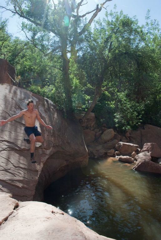 Jon Jasper jumping into pool at the end of Pine Creek.  Photo by Janel Macy.