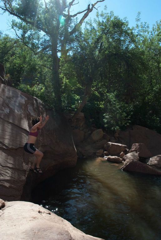 Kate Feller jumping into pool at the end of Pine Creek.  Photo by Janel Macy.